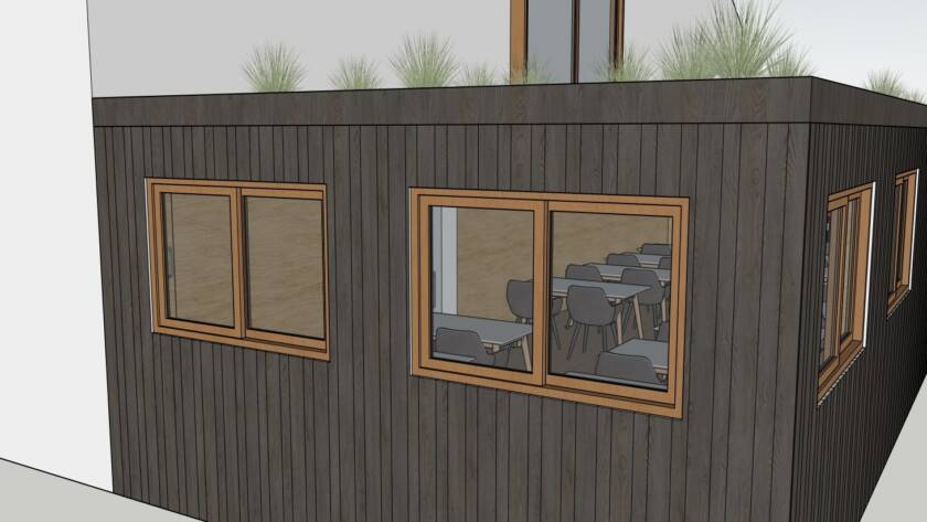 Planungsansicht eines Lernraums, Blick durch die Fenster auf Tische und Stühle im Innenraum